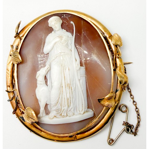 A large oval-shaped cameo shell brooch depicting Artemis, with foliate ...