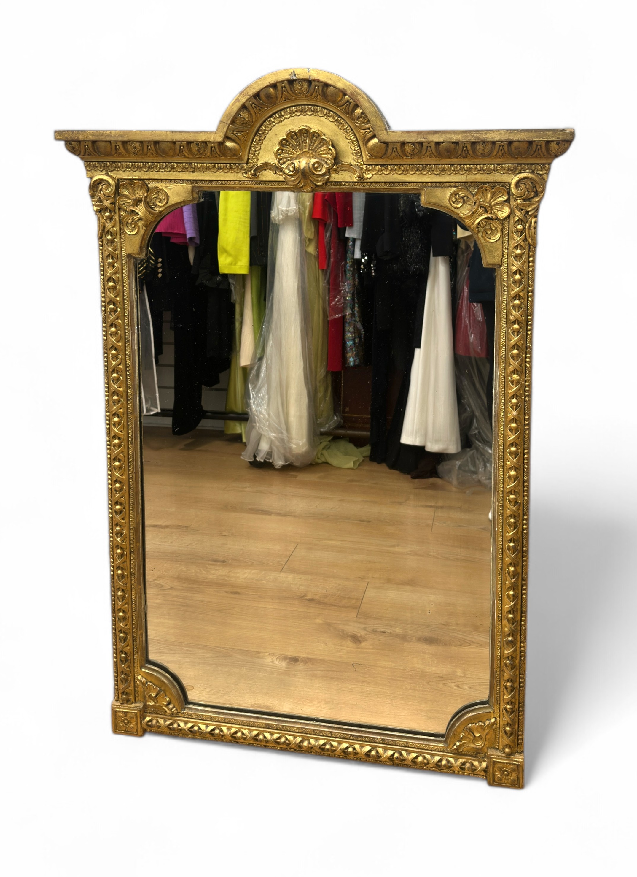 A 19th Century gilt wood and gesso wall mirror, carved frieze with ...