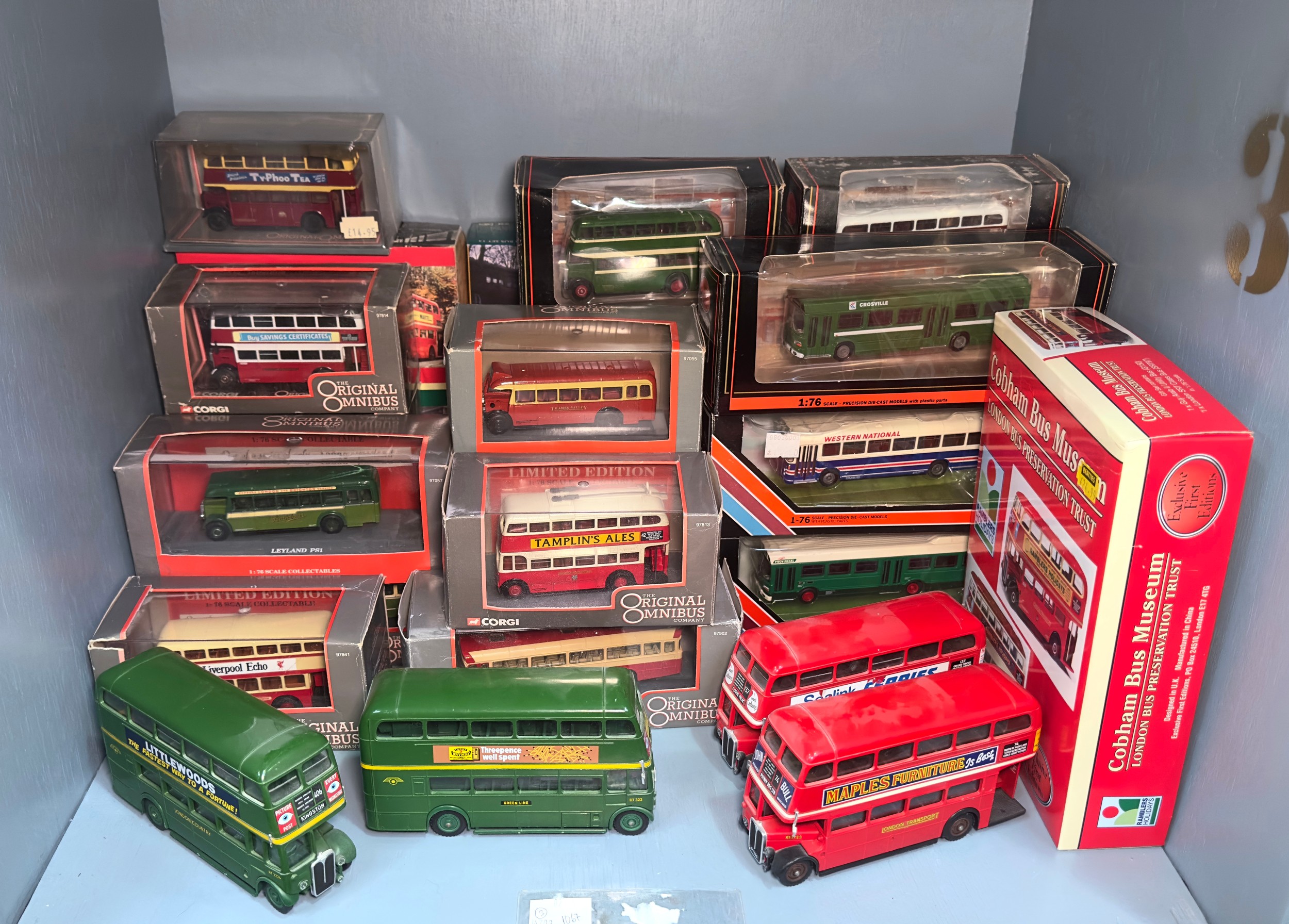 A large collection of assorted die-cast scale model buses, comprising ...
