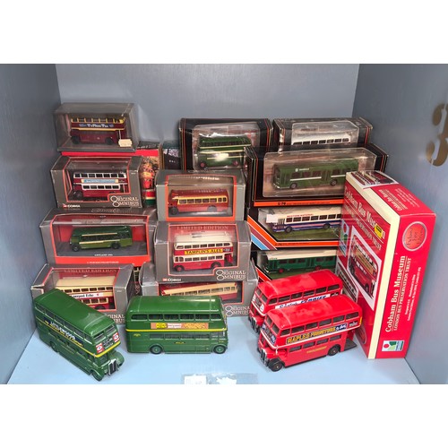 A large collection of assorted die-cast scale model buses, comprising ...