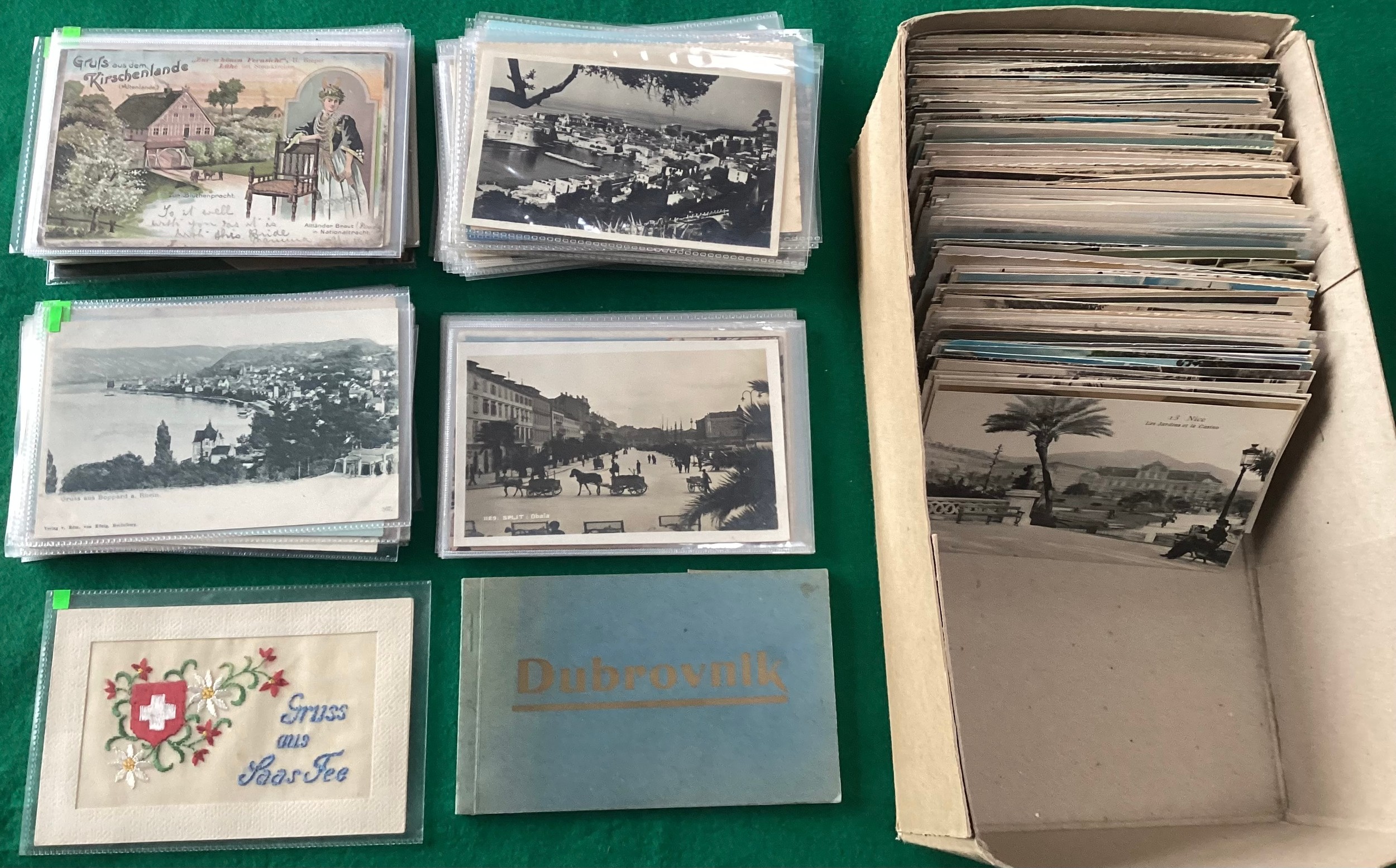 A box of several hundred foreign postcards. Various countries. Includes ...