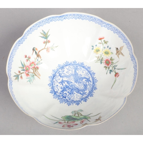 193 - A Chinese Republic period eggshell porcelain lobed bowl on hardwood plinth. Enamelled with pheasants... 