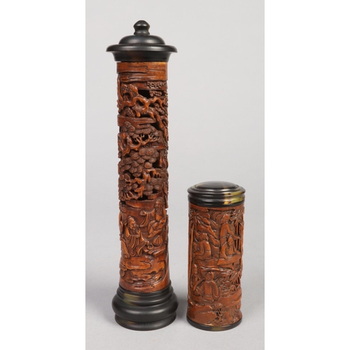 244 - Two Chinese carved and stained boxwood scroll jars / parfumier. Largest 27cm.