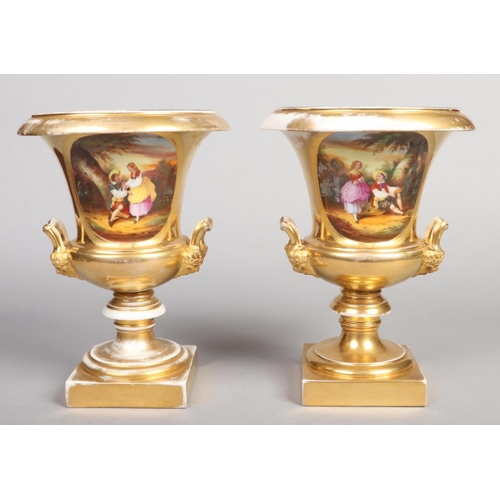 87 - A large pair of 19th century Paris porcelain mantel urns with twin satyr mask handles. Gilt ground a... 