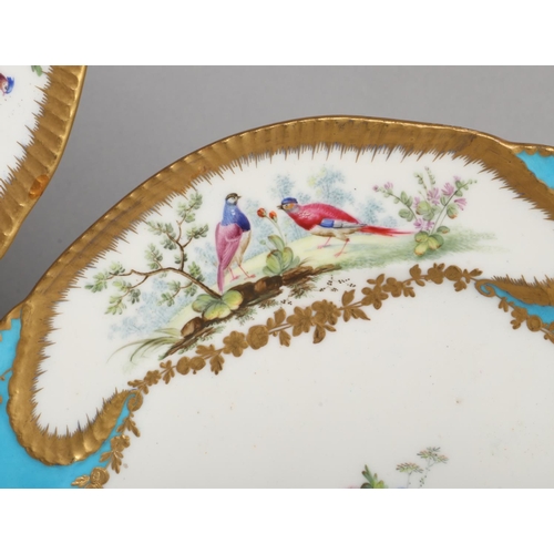 112 - Two Sevres dessert plates. Blue celeste ground, with tooled gilt cartouches containing birds in land... 