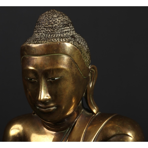 175 - A large 17th century Sino-Tibetan bronze statue of Buddha Shakyamuni. With glass inset eyes and seat... 