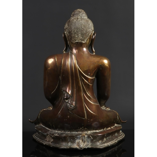 175 - A large 17th century Sino-Tibetan bronze statue of Buddha Shakyamuni. With glass inset eyes and seat... 