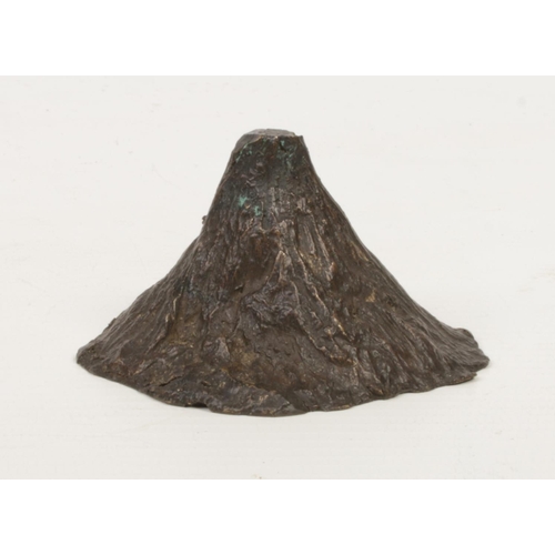 242 - A 19th century Chinese bronze scholars scroll weight formed as a mountain and raised on a hardwood p... 