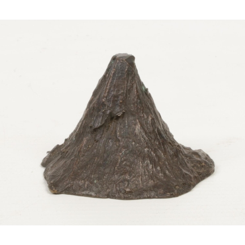 242 - A 19th century Chinese bronze scholars scroll weight formed as a mountain and raised on a hardwood p... 