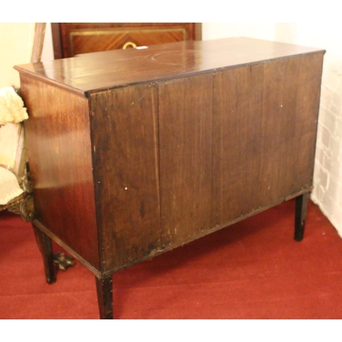 698 - A George III mahogany breakfront dressing chest. Oak lined, with bronze drop handles and raised on r... 