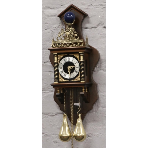 61 - A Dutch 8 day time and strike wall clock.