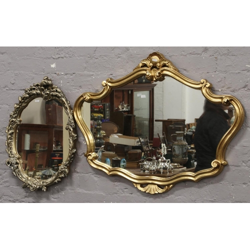 63 - Two gilt painted ornate wall mirrors.