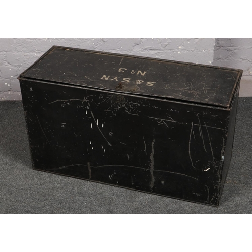 734 - A black painted tin trunk, stencilled S&SYN No.3.