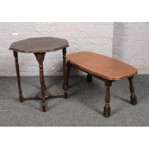 737 - A coffee table with hammered copper top, along with a mahogany window table.