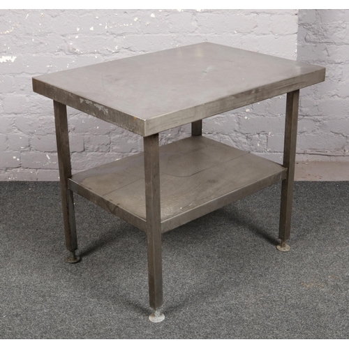 738 - A stainless steel two tier preparation table.