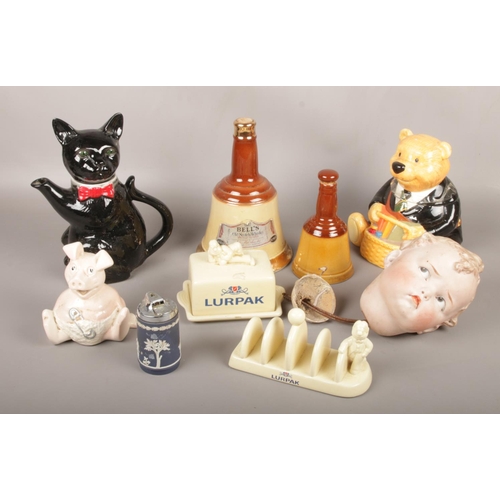 21 - A group of assorted ceramic's, Lurpuk butter dish and toast rack, Bell's Scotch Whiskey Wade decante... 