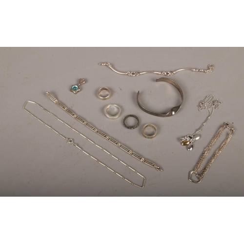 370 - A box of silver jewellery to include rings, pendant, bangle, bracelet etc.