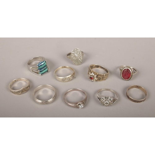 371 - Ten silver rings, to include marcasite examples.