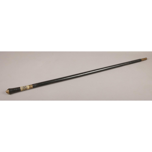 465 - An ebonised sword stick, with brass lion mask pommel. (Length 92cm).