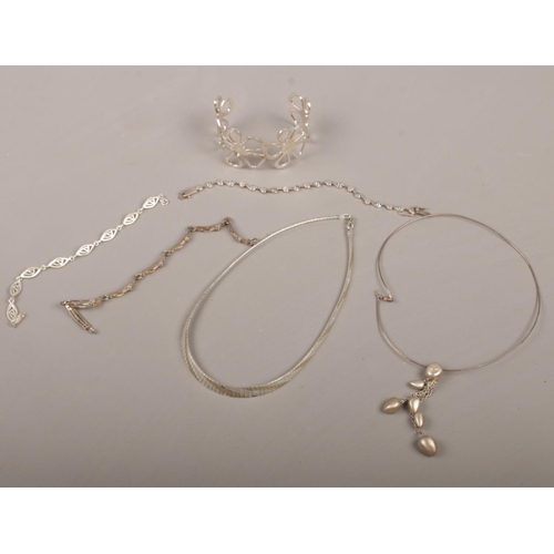 441 - A Cleopatra type silver necklet, another necklace, three bracelets and a bangle.