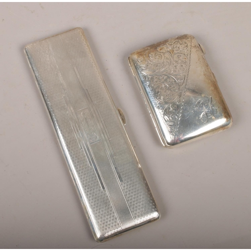 453 - Two silver cigarette cases to include large slender example assayed Birmingham 1933 by Northern Gold... 