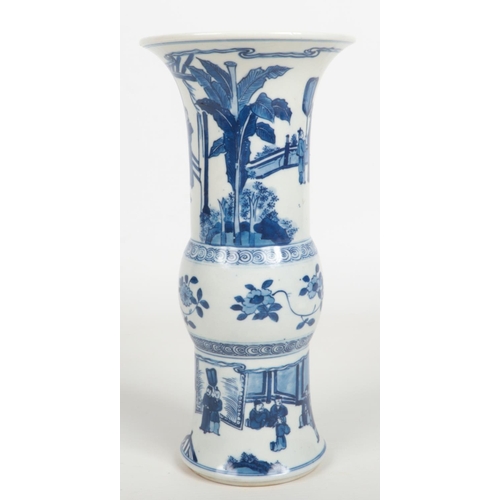 488 - A Chinese blue and white gu shaped vase. Painted in underglaze blue with figures in an outdoor setti... 