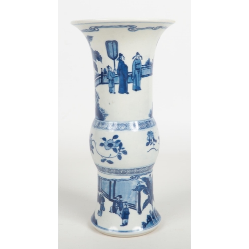 488 - A Chinese blue and white gu shaped vase. Painted in underglaze blue with figures in an outdoor setti... 