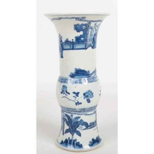 488 - A Chinese blue and white gu shaped vase. Painted in underglaze blue with figures in an outdoor setti... 