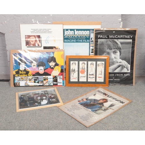 501 - A collection of The Beatles related poster and prints, to include framed Gordon Currie print.