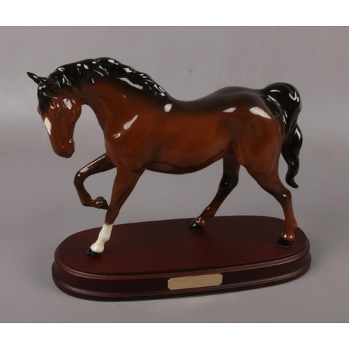 520 - A Royal Doulton horse figure, ' Spirit of Freedom' on wooden plinth, height 22 cm