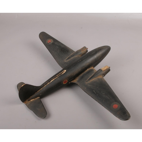 68 - A World War 2 painted wooden Aircraft recognition model, possibly a Bristol Blenheim, 46cm wide.