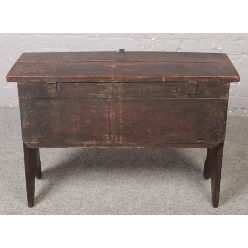 70 - An 18th century oak six plank coffer. Chip carved, with inscribed date 1771 and initialled W.L., 92c... 