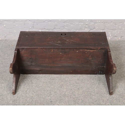 70 - An 18th century oak six plank coffer. Chip carved, with inscribed date 1771 and initialled W.L., 92c... 