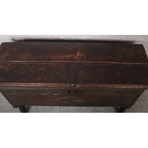 70 - An 18th century oak six plank coffer. Chip carved, with inscribed date 1771 and initialled W.L., 92c... 