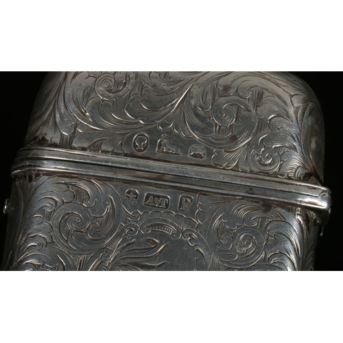 74 - A Victorian silver cigar case by Alfred Taylor. With a ground of engraved scrollwork and two cartouc... 