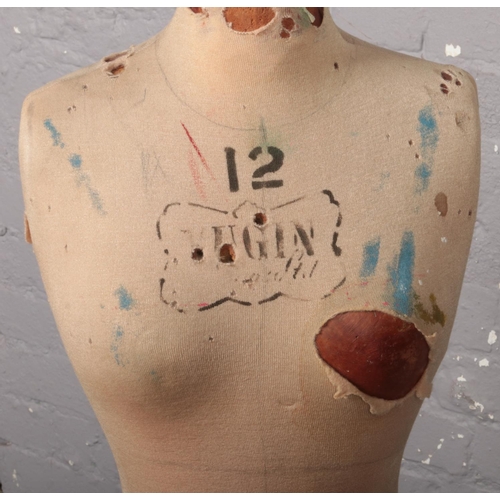 82 - A vintage Yugin & Sons tailors dummy or mannequin. Female in form, stencilled number 12 and with Yug... 