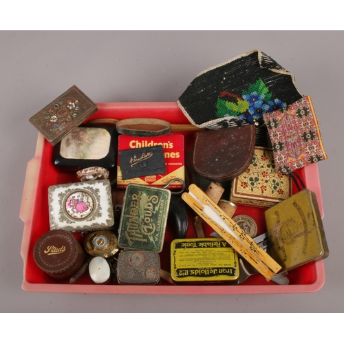 113 - A box of assorted collectables, to include tins, hand fan, Royal Air Force Station locket on chain e... 