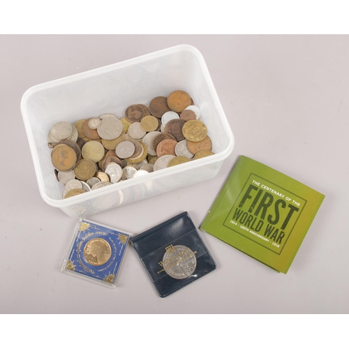 115 - A box of British pre decimal and world coins, to include Victorian silver examples.