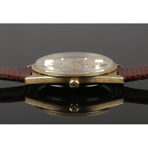 426 - A gentleman's gold capped Omega Automatic Constellation wristwatch. With satin dial, baton markers a... 