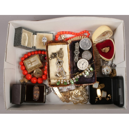 64 - A box of vintage costume jewellery and collectables. Including coral coloured beads, cufflinks, key ... 