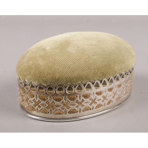 541 - A sterling silver mounted trinket box/ pin cushion.