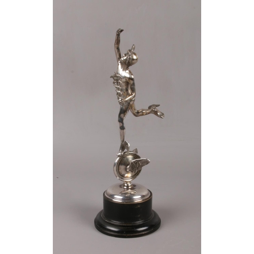 550 - A 1950s Isle of Man TT motorcycle racing trophy. Silver plated, formed as Mercury stood upon a winge... 