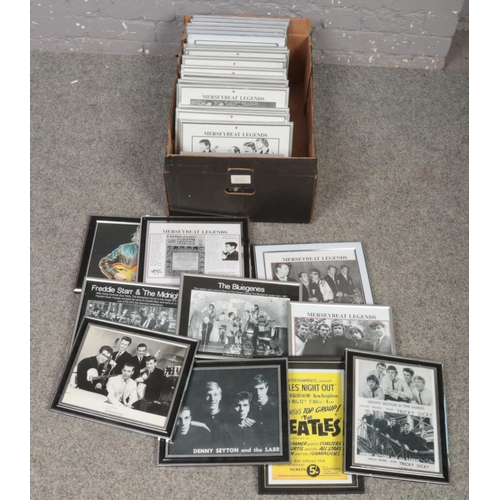 309 - A box of framed magazine cut outs to include Merseybeat Legends, Beatles flyer, printed photographs ... 