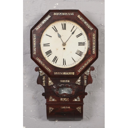 364 - A Victorian rosewood cased single fusee wall clock. With painted circular dial and having mother of ... 