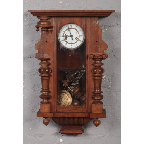 379 - A Gustav Becker walnut cased 8 day Vienna wall clock.