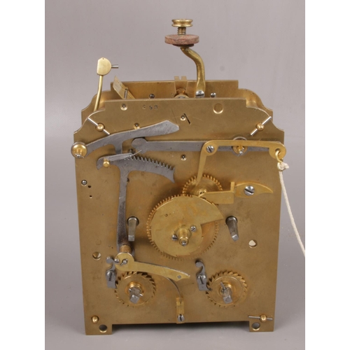 205 - A single fusee clock movement stamped E. C. & W. having silvered dial with Roman numeral markers and... 