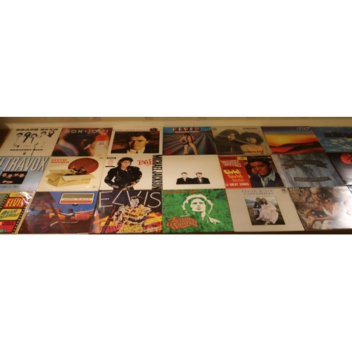 298 - Two boxes of LP records, to include Tyrannosaurus Rex, Elvis, The Beach Boys etc.