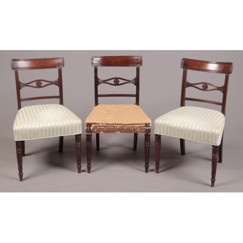 265 - A set of six Regency mahogany dining chairs. With reeded cresting rails supported on reeded uprights... 