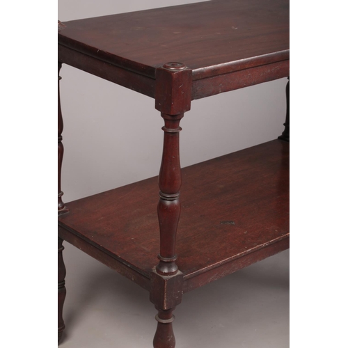 269 - A Regency mahogany two-tier buffet side table raised on turned supports.