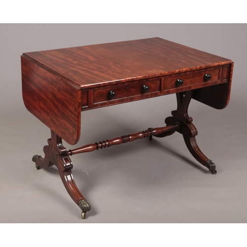 271 - A Regency mahogany sofa table. With a pair of drawers to the frieze and dummies to the back, turned ... 